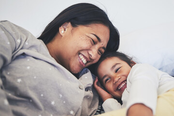 Poster - Laugh, mother and daughter in bed at home with love, care and happiness in morning. A young woman and girl child together in a bedroom for fun time, playing and security or relax in a family house