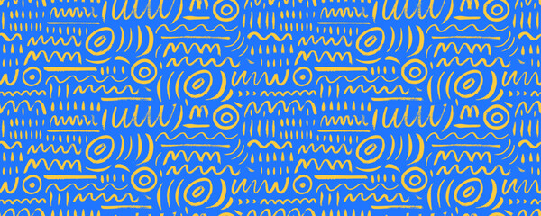 Various doodle lines seamless pattern in blue and yellow colors. Childish style creative art background. Squiggles, circles, dots and daubs. Simple childish scribble wallpaper texture.