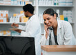 © Mumtaaz Dharsey/peopleimages.com - Pharmacist, woman and telephone for medicine stock, customer support and inventory communication or retail service. Medical worker or doctor on phone call and computer for pharmacy or healthcare FAQ