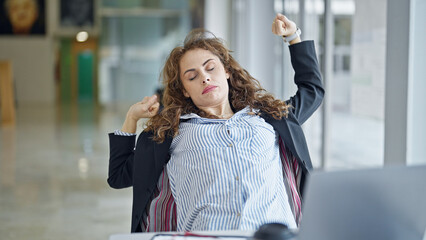 Sticker - Young woman business worker stretching arms at the office