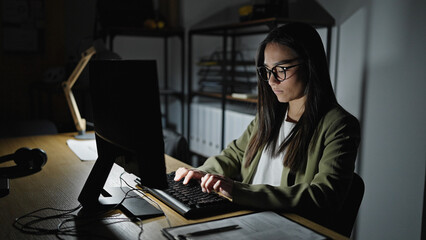 Wall Mural - Young beautiful hispanic woman business worker using computer working at office