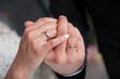 © Olga - Hands of newlyweds with wedding rings