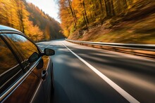 Car On The Road In The Autumn Forest. Speed Motion Blur Effect