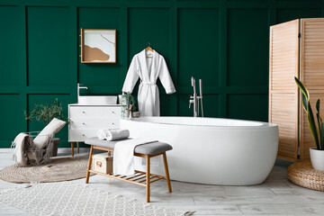 Poster - Interior of bathroom with soft bench and bathtub