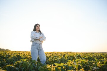 Sticker - A female farmer in soybean field