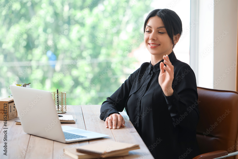 Beautiful woman having job interview online at home