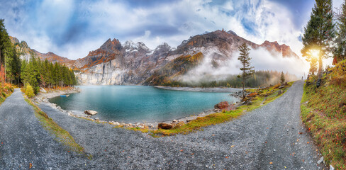 Wall Mural - spectacular autumn view of oeschinensee lake.