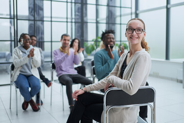 Wall Mural - Partial view of business people listening to mentor during business training in office