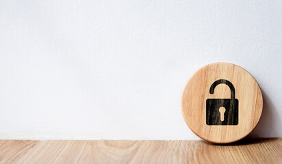 Security concept, protection, padlock icon on circle wood with white background and copy space.