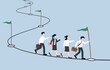© Yossakorn - Team progress on assigned task or project, team achievements and milestones concept, Business colleagues follow a path to place flags at each point of success.
