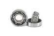 Ball and tapered roller bearing on white background