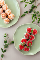 Wall Mural - japanese sushi rolls with a tuna cap on a plate