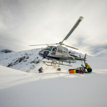 Square Crop Of Helicopter Lifting Off In Winter Conditions