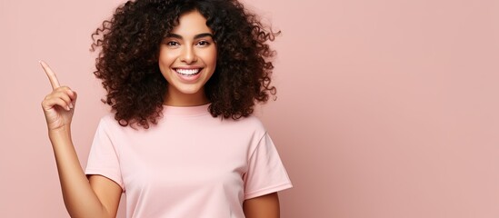 Poster - Happy and satisfied Hispanic woman casually points to side with a cheerful smile