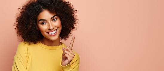 Poster - Happy and satisfied Hispanic woman casually points to side with a cheerful smile