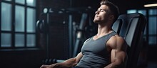 Fit Young Man Resting In Gym With Empty Space On The Left