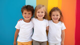 Little children wearing white t-shirts stand together, smile, hug each other, smiling 3 or 5 years old kids, photo for apparel mock-up