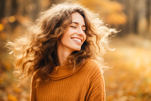 Beautiful Young Woman Portrait Smiling In Autumn Park Outdoors. Happiness, Calm, Wellness, Peace.