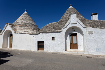 Wall Mural - The Trulli of Alberobello, the typical limestone houses in the province of Bari, Puglia, Italy