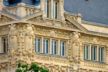 Wall Mural - detail of the facade of the Galeries de Jaude, an old department store located on the Place de Jaude in Clermont-Ferrand in France.