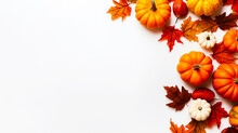 Mage Of Pumpkins And Autumn Leaves With Copy Space On White Background