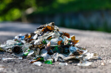 Pile Of Broken Glass On The Road. Small Pieces Of Glass. Broken Bottles On The Nature.