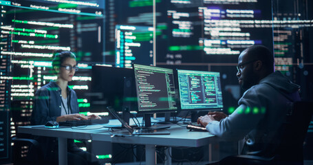 Leinwandbilder - Portrait of Two Diverse Developers Working on Computers, Typing Lines of Code that Appear on Big Screens Surrounding Them. Male and Female Programmers Creating Innovative Software, Fixing Bugs.