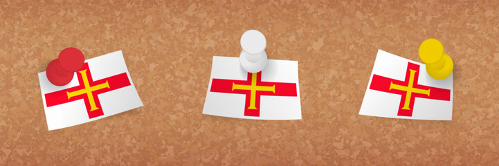 Sticker - Guernsey flag pinned in cork board, three versions of Guernsey flag.