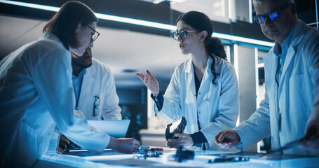 Poster - Portrait of a Group of Industrial Robotics Engineers Working on Humanoid Robot, Consulting with Specialists and Analyzing Electronic Components. Female Scientist Having a Meeting with Her Team.