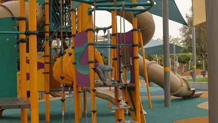 Sticker - Happy children, boys, playing on playground in Tel Aviv, israel on a hot summer day