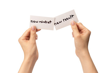 new mindset - new result text on a card in a woman hand isolated.