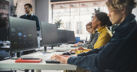 Aufkleber - Educator Giving Lesson to Diverse Multiethnic Group of Female and Male Students in College Room. Class Learning About Computer Science and Software Development. Lecturer Shares Knowledge with Scholars