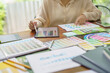 © Charlie's - Creative idea Business female Artist Creative Designer sketch graphic drawing on graphic tablet and Color swatch samples Concept of idea creativity.