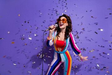 Sticker - Photo of adorable cool girl dressed striped overall dark eyewear singing songs dancing disco isolated violet color background