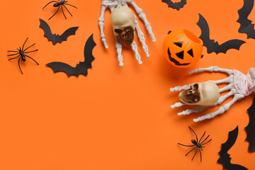 Sticker - Skeleton hands, skulls, pumpkin, paper bats and spiders for Halloween celebration on orange background