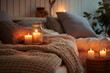Cozy bedroom with candles and cushions