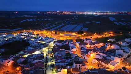 Wall Mural - Sunset in Castro Marim. Aerial view from a drone. Lighthouse district. Marshes and salt flats of the Ria Formosa Natural Park. Atlantic Ocean. Algarve. Portugal. Europe