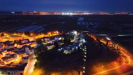 Wall Mural - Sunset in Castro Marim. Aerial view from a drone. Lighthouse district. Marshes and salt flats of the Ria Formosa Natural Park. Atlantic Ocean. Algarve. Portugal. Europe