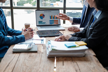 Aufkleber - Business team analyzing income charts and graphs with modern laptop computer. Close up.Business analysis and strategy concept.