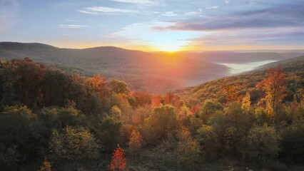 Wall Mural - Beautiful Arkansas ozark mountain scenic overlook in fall with autumn colored forest via aerial viewpoint at sunrise