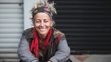 Homeless White Woman Smiling. Unemployed Person