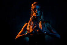 Photo Of Wild Dangerous Lady Wear Viking Clothes Praying Death Gods Isolated Dark Orange Blue Color Background