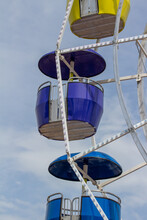 Close Up View Of Colorful Passenger Cabins On An Amusement Park Ferris Wheel