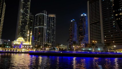 Wall Mural - Modern city in the night, Dubai Marina view in the night. High quality 4k footage