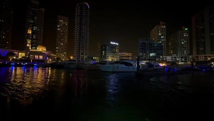 Wall Mural - Modern city in the night, Dubai Marina view in the night. High quality 4k footage