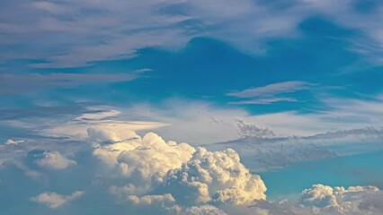 Wall Mural - Thick Fluffy Clouds Rolling On Blue Clear Sky. Timelapse