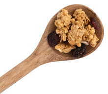 crunchy granola in wooden spoon isolated on white background with clipping path, muesli pile with nuts, cranberry and raisins close