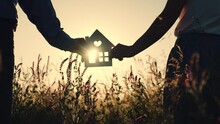 Dream Buy Cozy Apartment House. Sun Shines Window. House Silhouette. Hold In Hands The Silhouette House. Buying Dream Big Bright House. Own Comfortable Room. Hands Happy Family. Sign Symbol.