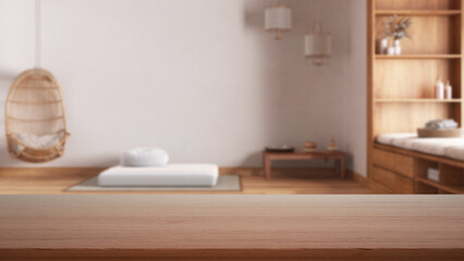 Wall Mural - Empty wooden table, desk or shelf with blurred view of minimal zen meditation room with paper doors and resin floor, modern interior design concept