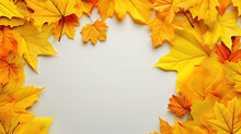 White Background With Autumn Yellow Leaves In A Circle. Empty Space For Product Placement Or Promotional Text.